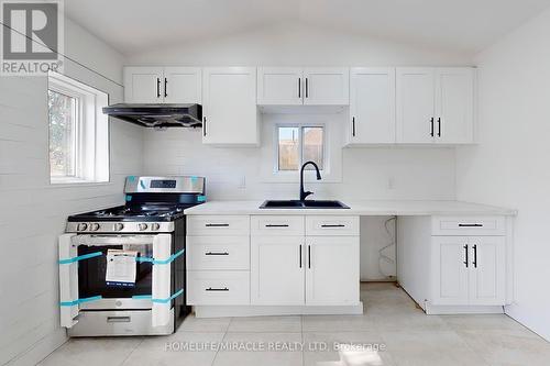 971 Ormsby Street, London, ON - Indoor Photo Showing Kitchen With Double Sink