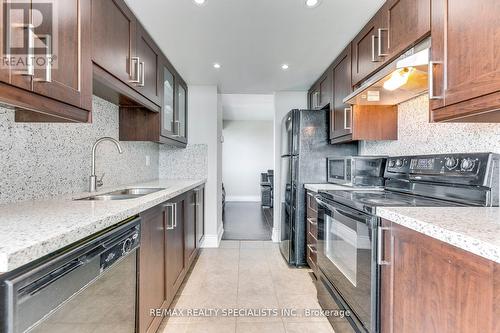 702 - 9 George Street, Brampton, ON - Indoor Photo Showing Kitchen With Double Sink With Upgraded Kitchen