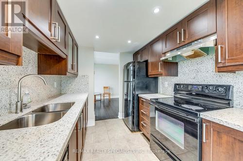 702 - 9 George Street, Brampton, ON - Indoor Photo Showing Kitchen With Double Sink