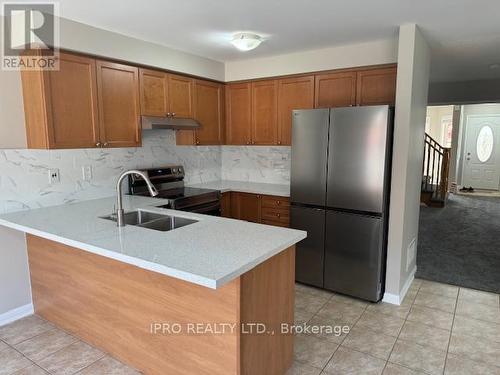 792 Bolingbroke Drive, Milton, ON - Indoor Photo Showing Kitchen With Double Sink