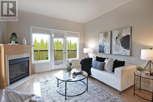 7 - 213 Nash Road S, Hamilton, ON - Indoor Photo Showing Living Room With Fireplace