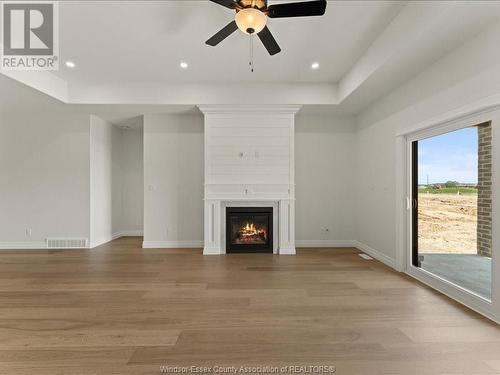 3265 Tullio Drive, Lasalle, ON - Indoor Photo Showing Other Room With Fireplace