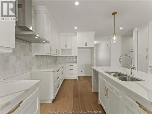 3265 Tullio Drive, Lasalle, ON - Indoor Photo Showing Kitchen With Double Sink