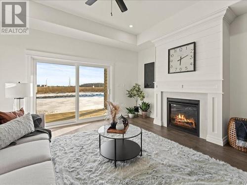 3198 Tullio Drive, Lasalle, ON - Indoor Photo Showing Living Room With Fireplace