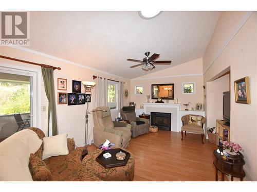 415 Hummingbird Avenue, Vernon, BC - Indoor Photo Showing Living Room With Fireplace