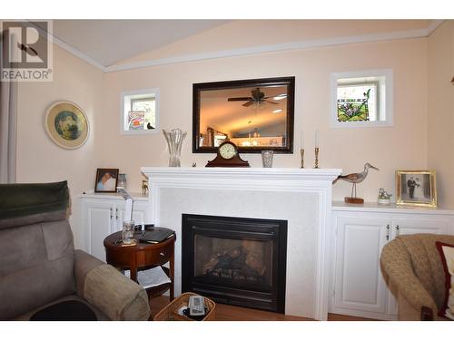 415 Hummingbird Avenue, Vernon, BC - Indoor Photo Showing Living Room With Fireplace