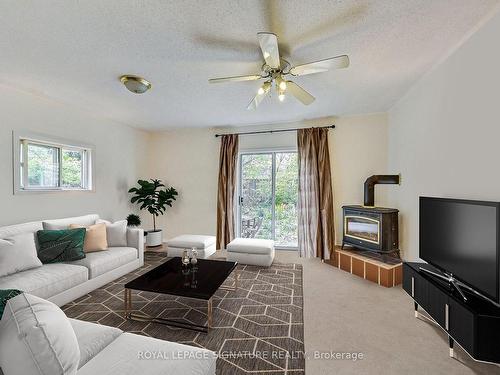 20 Twelfth St, Toronto, ON - Indoor Photo Showing Living Room With Fireplace