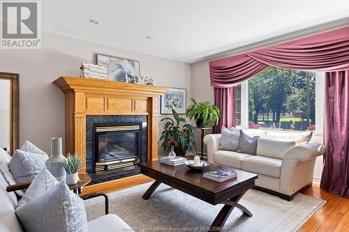 13902 Riverside Drive East, Tecumseh, ON - Indoor Photo Showing Living Room With Fireplace