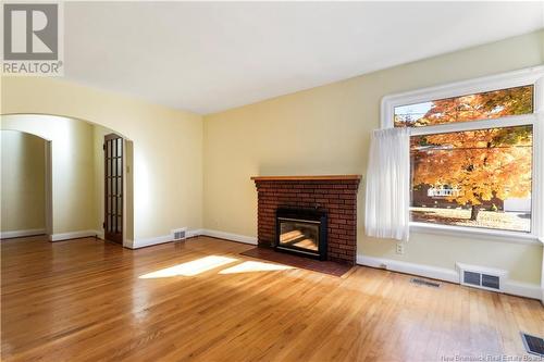 28 Kensington, Moncton, NB - Indoor Photo Showing Living Room With Fireplace