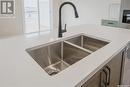 338 Myles Heidt Lane, Saskatoon, SK  - Indoor Photo Showing Kitchen With Double Sink 