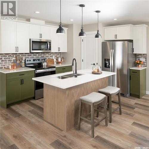 334 Myles Heidt Lane, Saskatoon, SK - Indoor Photo Showing Kitchen With Double Sink With Upgraded Kitchen