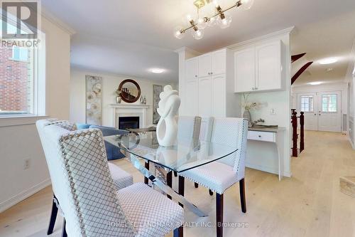 30 Ambler Bay, Barrie, ON - Indoor Photo Showing Dining Room With Fireplace