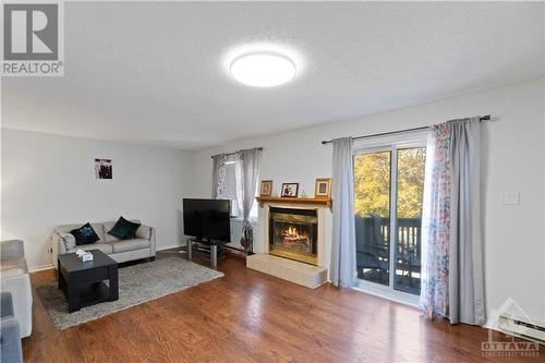 6 Terrace Drive Unit#207, Ottawa, ON - Indoor Photo Showing Living Room With Fireplace