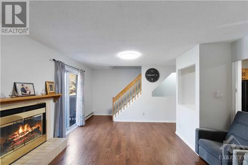 6 Terrace Drive Unit#207, Ottawa, ON - Indoor Photo Showing Living Room With Fireplace