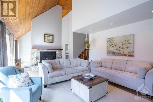 1472 South Russell Road, Russell, ON - Indoor Photo Showing Living Room With Fireplace