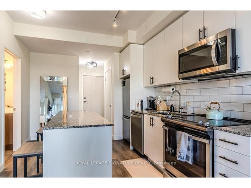 216-168 Sabina Dr, Oakville, ON - Indoor Photo Showing Kitchen With Stainless Steel Kitchen With Upgraded Kitchen