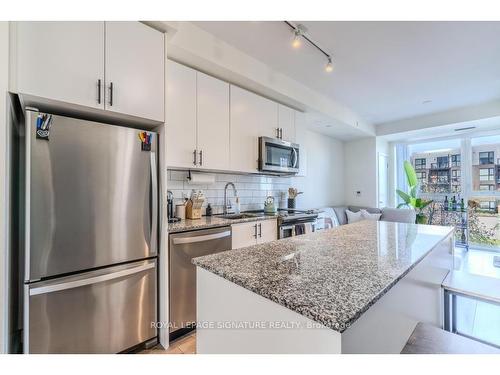 216-168 Sabina Dr, Oakville, ON - Indoor Photo Showing Kitchen With Stainless Steel Kitchen With Upgraded Kitchen