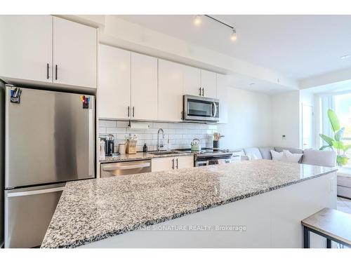 216-168 Sabina Dr, Oakville, ON - Indoor Photo Showing Kitchen With Stainless Steel Kitchen With Upgraded Kitchen