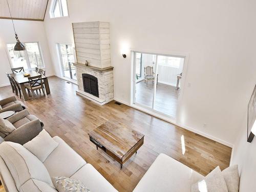 Salon - 217 Rue Des Pinsons, Magog, QC - Indoor Photo Showing Living Room With Fireplace