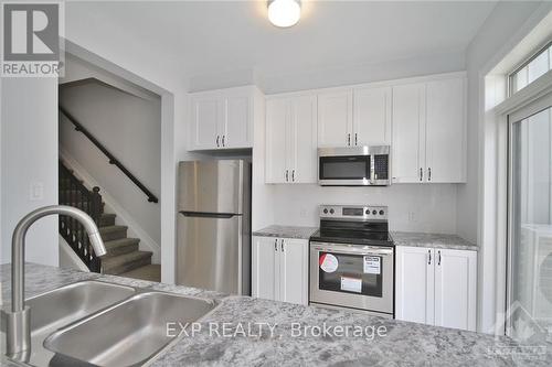 144 Anthracite, Ottawa, ON - Indoor Photo Showing Kitchen With Stainless Steel Kitchen With Double Sink