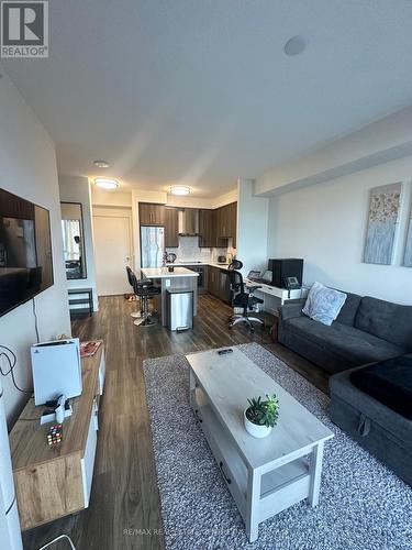 603 - 2081 Fairview Street, Burlington, ON - Indoor Photo Showing Living Room