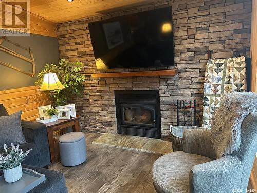 2003 Fox Street, Missinipe, SK - Indoor Photo Showing Living Room With Fireplace