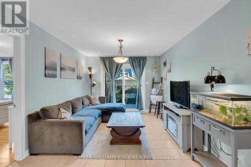 28 Tolton Avenue, Hamilton, ON - Indoor Photo Showing Living Room With Fireplace