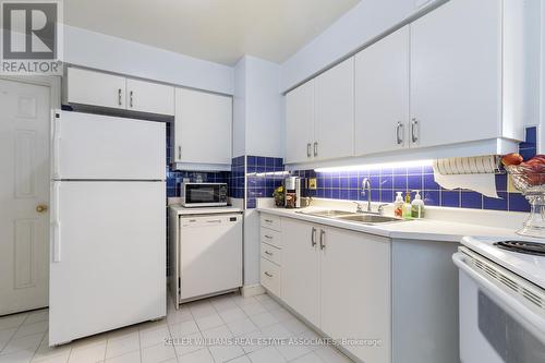 1912 - 3605 Kariya Drive, Mississauga, ON - Indoor Photo Showing Kitchen With Double Sink