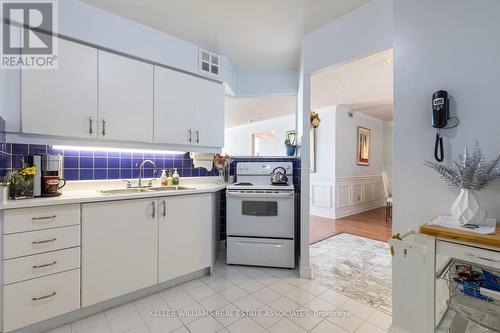 1912 - 3605 Kariya Drive, Mississauga, ON - Indoor Photo Showing Kitchen With Double Sink