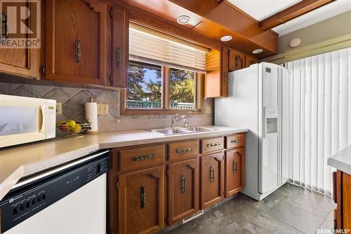 1212 Gryphons Walk, Regina, SK - Indoor Photo Showing Kitchen With Double Sink