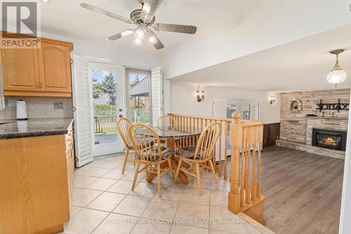 305 Ulric Crescent, Oakville, ON - Indoor Photo Showing Dining Room With Fireplace