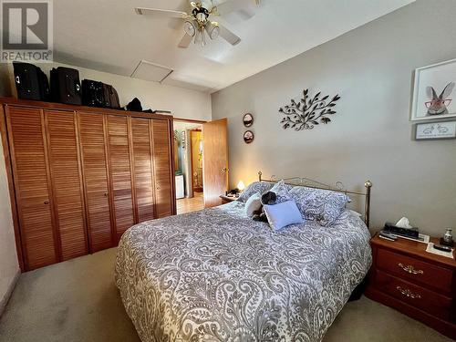 108 3Rd Avenue Nw, Nakusp, BC - Indoor Photo Showing Bedroom