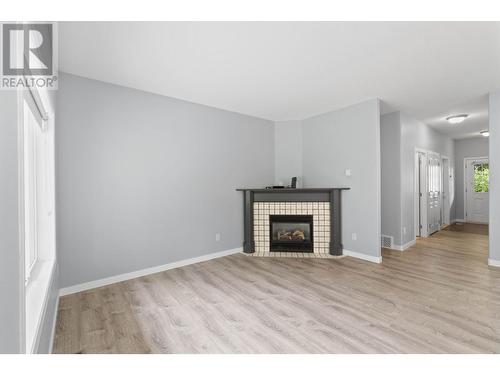 217 Sagewood Drive, Kamloops, BC - Indoor Photo Showing Living Room With Fireplace