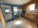 319 4Th Avenue W, Kindersley, SK  - Indoor Photo Showing Kitchen With Double Sink 