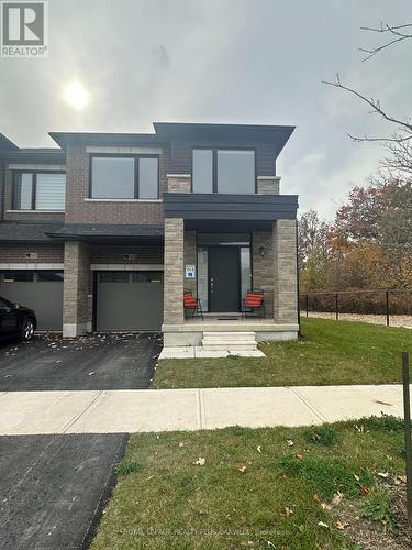 1430 Rose Way, Milton, ON - Outdoor With Facade