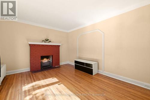 34 Lewis Street, Belleville, ON - Indoor Photo Showing Living Room With Fireplace