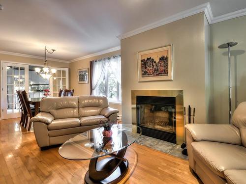 Living room - 4600Z Av. Charlemagne, Montréal (Rosemont/La Petite-Patrie), QC - Indoor Photo Showing Living Room With Fireplace