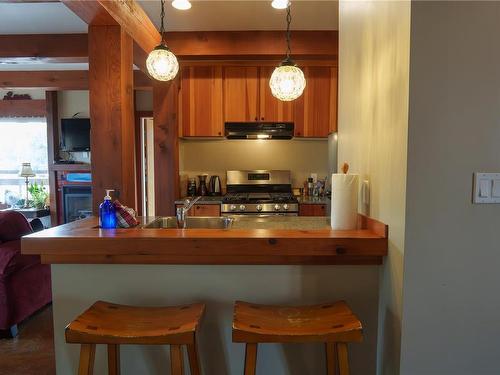 212-1645 Cedar Rd, Ucluelet, BC - Indoor With Fireplace