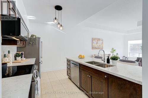 105 - 5070 Fairview Street, Burlington, ON - Indoor Photo Showing Kitchen With Double Sink