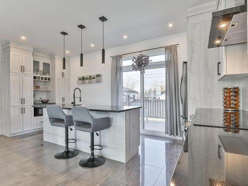 Cuisine - 121 Rue Des Lavandes, Lavaltrie, QC - Indoor Photo Showing Kitchen With Upgraded Kitchen