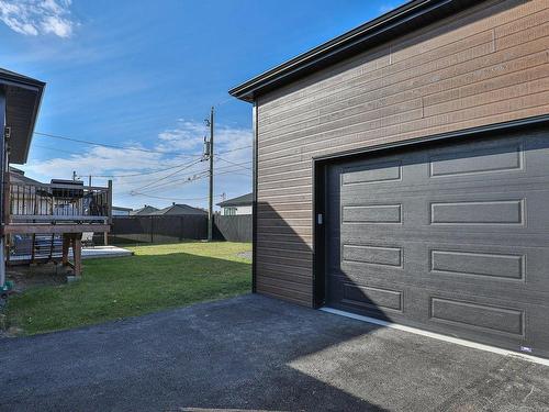 Garage - 121 Rue Des Lavandes, Lavaltrie, QC - Outdoor With Exterior