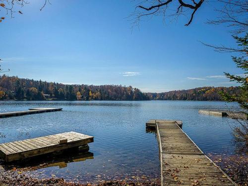 1626 Ch. De La Baie-Du-Lac, Saint-Sauveur, QC - Outdoor With Body Of Water With View