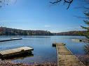 1626 Ch. De La Baie-Du-Lac, Saint-Sauveur, QC  - Outdoor With Body Of Water With View 