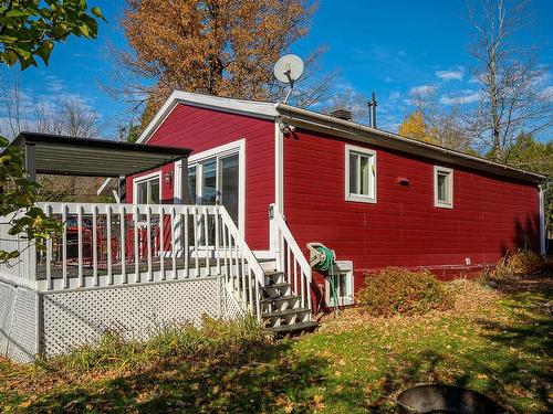 Back facade - 1626 Ch. De La Baie-Du-Lac, Saint-Sauveur, QC - Outdoor With Exterior