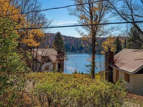 View - 1626 Ch. De La Baie-Du-Lac, Saint-Sauveur, QC - Outdoor With Body Of Water With View