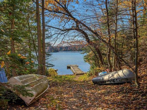 1626 Ch. De La Baie-Du-Lac, Saint-Sauveur, QC - Outdoor With Body Of Water With View