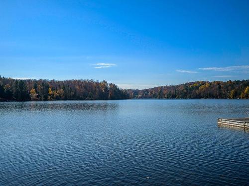 1626 Ch. De La Baie-Du-Lac, Saint-Sauveur, QC - Outdoor With Body Of Water With View