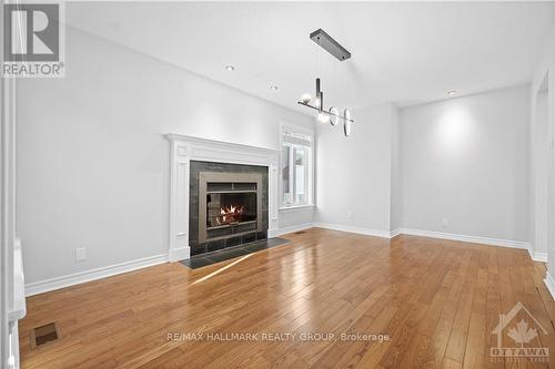 124 Sai Crescent, Ottawa, ON - Indoor Photo Showing Living Room With Fireplace