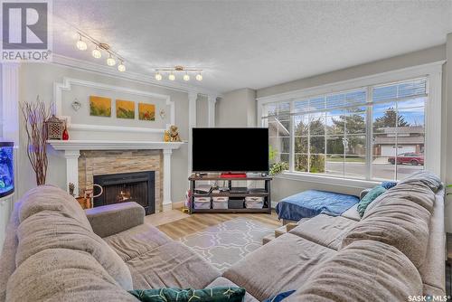 438 Charlebois Terrace, Saskatoon, SK - Indoor Photo Showing Living Room With Fireplace