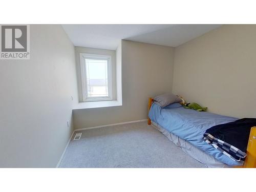 9607 113 Avenue, Fort St. John, BC - Indoor Photo Showing Bedroom